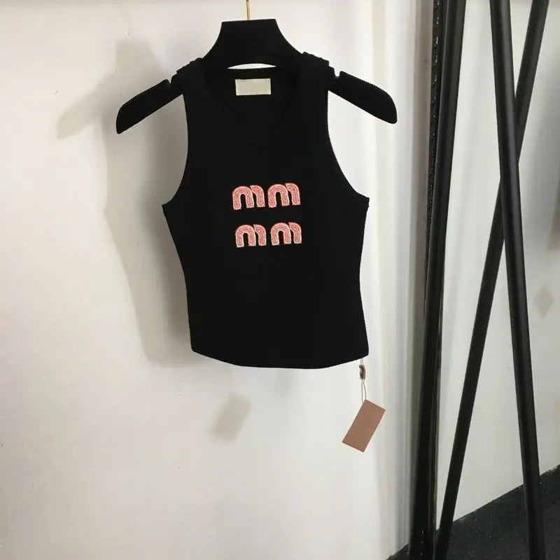 Top avec logo brodé